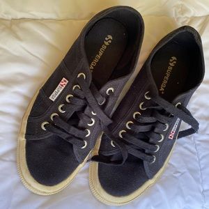 Used but in great shape! Ladies Superga navy blue size 8